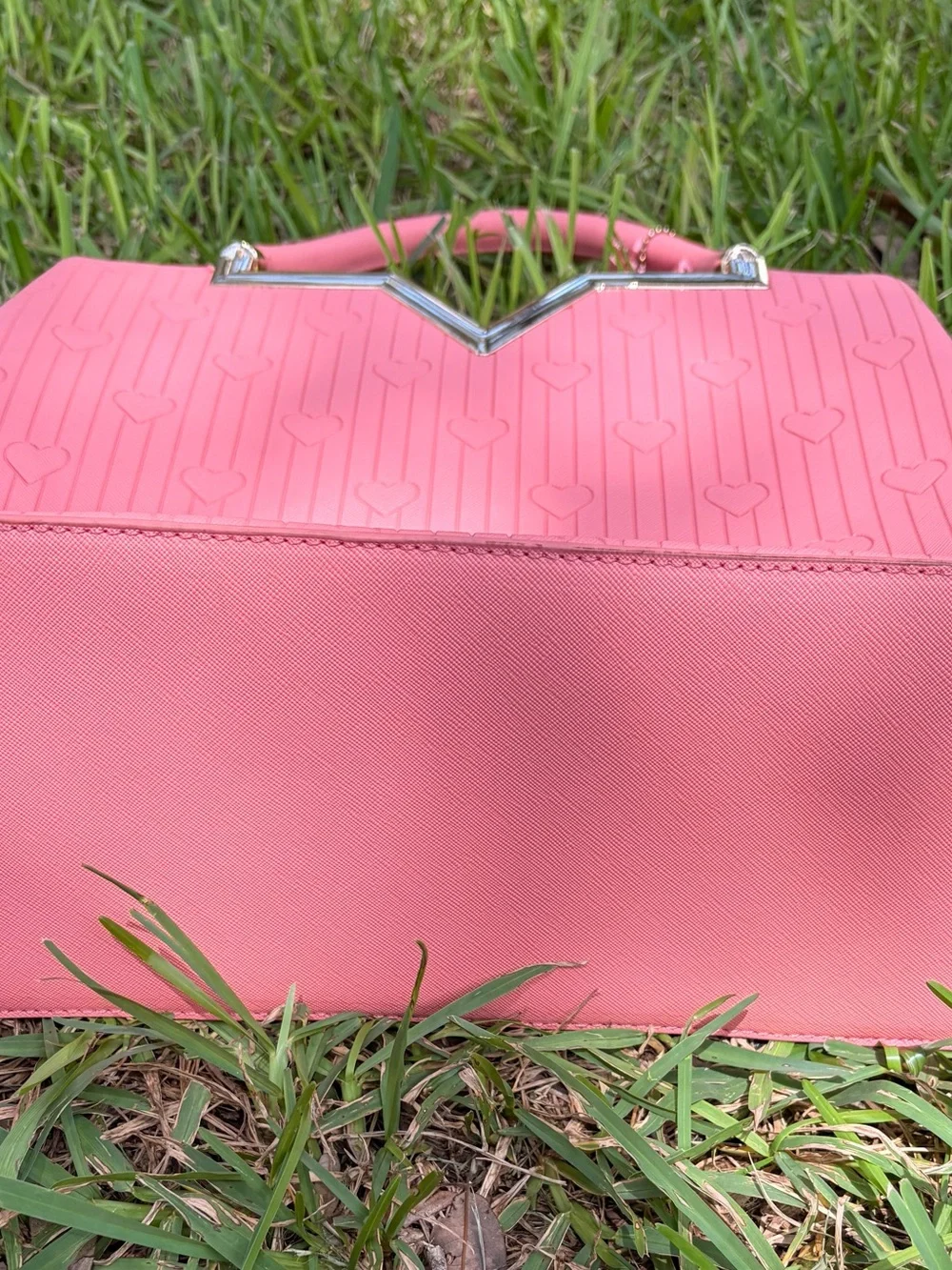 Crossi Pink Structured Heart-Embossed Tote Bag with Tassel Charm